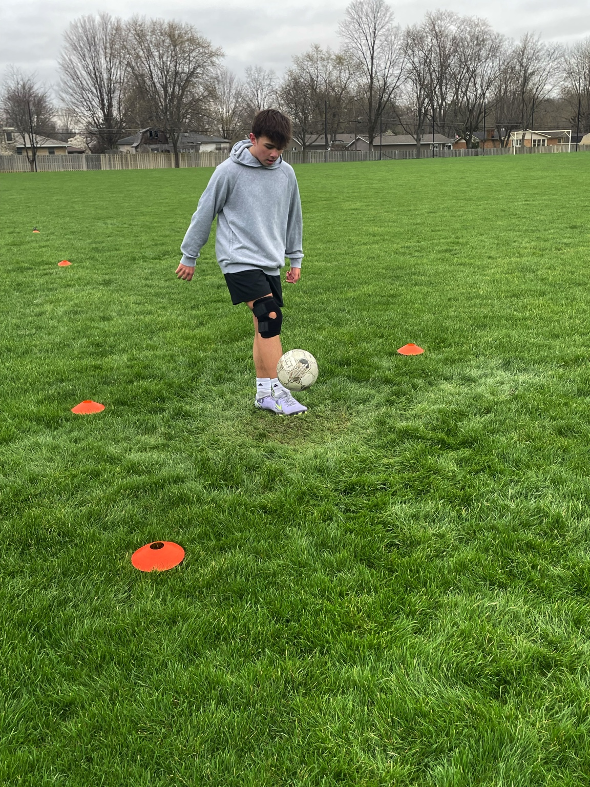 Kenan practicing juggling fundamentals